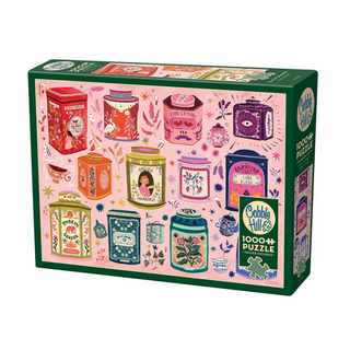 Enjoy eco-friendly fun with the Cobble Hill Tea Tin Treasures 1,000-piece puzzle, featuring illustrated tea canisters among decorative leaves and flowers on a pink background, made from recycled cardboard.