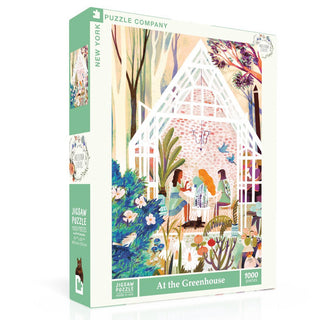 The At the Greenhouse | 1,000 Piece Jigsaw Puzzle by New York Puzzle Company features Adelina Lirius’s art of three people in a lush glass greenhouse, perfect for nature lovers. Linen finish ensures a premium feel.