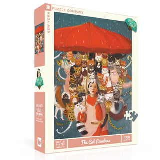 The Cat Countess | 1,000 Piece Jigsaw Puzzle by New York Puzzle Company features a woman with a red umbrella surrounded by cats in the rain—a purrfect choice for cat lovers and puzzle fans.