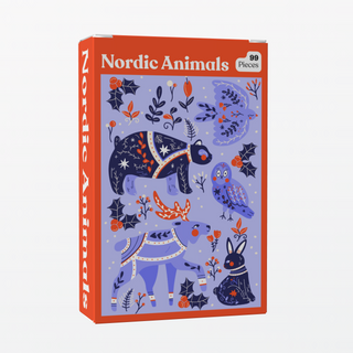 Puzzledly’s Nordic Animals | 99 Piece Jigsaw Puzzle is a pocket-sized box featuring illustrated bear, deer, rabbit, fox, and birds on a light purple floral background.
