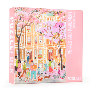 The Petals and Pavement | 500 Piece Jigsaw Puzzle by Puzzlefolk features Emma Block’s illustration of people and pets strolling among blooming trees and brownstones, all in pastel colors.