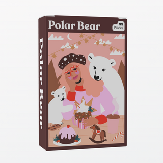 The Polar Bear | 99 Piece Jigsaw Puzzle by Puzzledly features an illustrated woman with pink hair and glasses, two polar bears, desserts, and festive decor. This pocket-sized puzzle has ribbon-cut pieces and "Polar Bear" on the box.