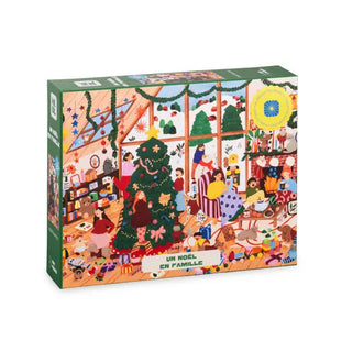 The Un Noël en Famille | 1,000 Piece Jigsaw Puzzle by Heol Editions features vibrant artwork of a family celebrating Christmas around a decorated tree with presents in a festive living room. The box displays the title "Un Noël en famille." Made in France, this charming puzzle is perfect for adding holiday warmth to your home.