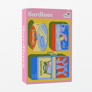 Puzzledly’s Sardines | 99 Piece Jigsaw Puzzle comes in a pink box with illustrations of four opened sardine cans showing fish. This pocket-sized puzzle is perfect for on-the-go fun.