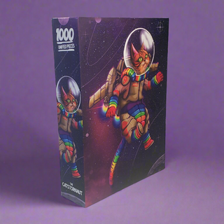 Catstornaut by Unified Pieces is a 500-piece jigsaw puzzle with an irregular cut, featuring a cat in a rainbow spacesuit floating in space, inspired by Afro-Caribbean art.