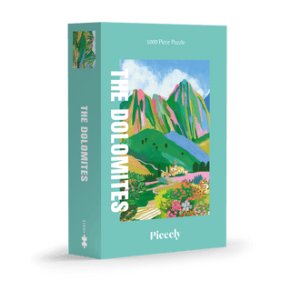 The Dolomites | 1,000 Piece Jigsaw Puzzle by Piecely showcases a vibrant illustrated mountain landscape with flowers and a village, all in plastic-free packaging.