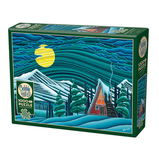 The Cobble Hill Winter Tranquility 1,000-piece jigsaw puzzle features an illustrated cabin in snowy woods beneath a swirling blue night sky and bright yellow moon, evoking the beauty of a painted Canadian winter landscape.