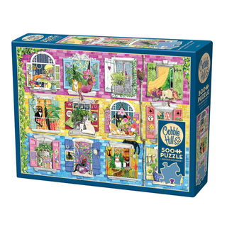 The Cobble Hill “Living with Catitude” 500-piece jigsaw puzzle features vibrant illustrations of cats around decorated windows and includes random-cut pieces for a unique, high-quality puzzling experience.