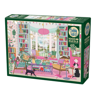 The Cobble Hill Book Club 1,000 Piece Jigsaw Puzzle features an illustration of a colorful, cat-filled living room complete with bookshelves, plants, and a large window—making it the perfect charming book-themed puzzle for any enthusiast.