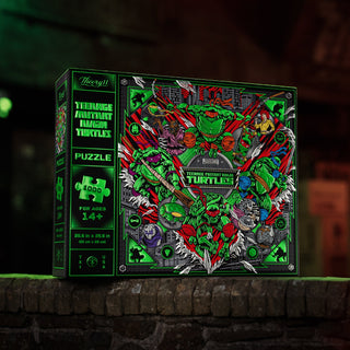 The theory11 Teenage Mutant Ninja Turtles | 1,000 Piece Jigsaw Puzzle features vibrant artwork of the turtles and villains and is designed for ages 14+. Shown on a stone surface.
