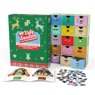 A box labeled “Ugly Christmas Sweater Puzzle Advent” from Boardwalk Puzzle Company is shown with numbered drawers, an open booklet, and holiday-themed sweater puzzle pieces spread out in front.