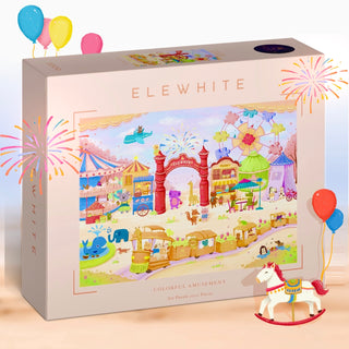 Box of Elewhite’s Colorful Amusement 1,000 piece jigsaw puzzle with a vibrant amusement park scene, made from premium puzzle board and decorated with digital balloons and fireworks graphics.