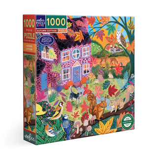 The eeBoo Autumn Cottage 1,000 Piece Jigsaw Puzzle features a vibrant fall scene with colorful leaves, animals, birds, and a pink house in an autumn landscape.