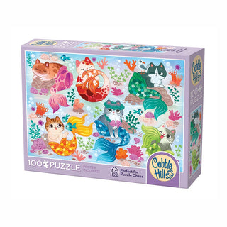 The Cobble Hill Mercats 100 Piece Jigsaw Puzzle features large pieces and illustrated mermaid cats in vibrant underwater scenes with coral and fish. Poster included.