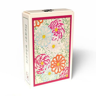 The Flower Wheels | 99 Piece Jigsaw Puzzle by Penny Puzzle comes in a rectangular box with a floral design of colorful, overlapping flowers and "flower wheels" text, inspired by vintage Meiji-era Japanese puzzle art.