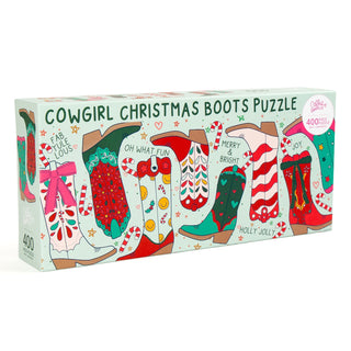 The Callie Danielle Christmas Western Cowgirl Boots | 400 Piece Panoramic Jigsaw Puzzle comes in a rectangular box, featuring festive cowgirl boots—perfect as a unique holiday gift.
