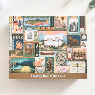 The Let's Go Camping | 1,000 Piece Jigsaw Puzzle by Spaghetti Tree features colorful illustrations of outdoor scenes, animals, nature elements, and motivational quotes.