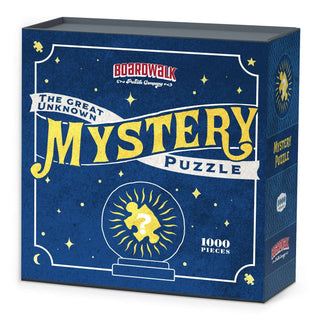 A blue and yellow box labeled Boardwalk Mystery Puzzle by Boardwalk Puzzle Company, featuring a crystal ball design and containing a challenging 1,000 piece jigsaw puzzle.