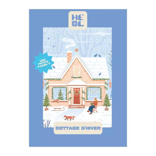 Charming illustration of a snowy cottage with a person, dog, and cat outside. Features "Cottage d’Hiver" and "Une petite pause !" on a blue border. Cottage D'hiver | 99 Piece Jigsaw Puzzle by Heol Editions. Made in France.