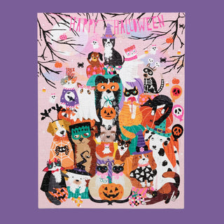 Happy Halloween | 500 Piece Jigsaw Puzzle by WerkShoppe features cats and dogs in Halloween costumes among pumpkins, skulls, and spooky decor, with "Happy Halloween" at the top—a festive challenge for puzzlers.