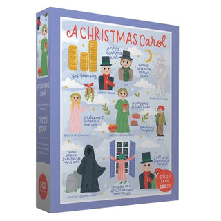 The Pippi Post “A Christmas Carol” 500 Piece Jigsaw Puzzle features illustrated characters and scenes from the classic tale, including Scrooge, ghosts, and festive details, all presented in a beautifully designed box.