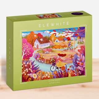 Elewhite Autumn Breeze | 500 Piece Jigsaw Puzzle features original artwork of an autumn landscape with colorful trees, flowers, houses, and a pondside bicycle. Made from premium puzzle board for lasting durability.