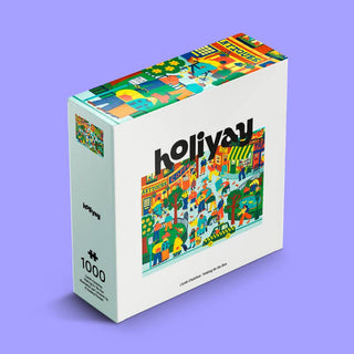 A 1,000-piece jigsaw puzzle box titled "Waiting For the Bus," featuring colorful artwork of a lively town scene by Roanna Farmer, with the Holiyay Puzzles brand name displayed on the front against a vibrant purple background.