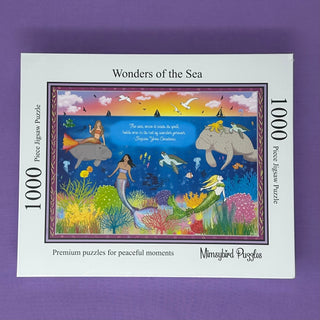 Mimsybird Puzzles’ Wonders of the Sea | 1,000 Piece Jigsaw Puzzle features an illustrated underwater scene with mermaids, sea creatures, and vibrant coral.