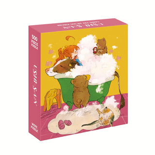 The WEVE Ushi-San 500 Piece Jigsaw Puzzle features a girl and three dogs in a bubble bath, with a cat and pink slippers on a patterned floor. Made from recycled paper, it’s an eco-friendly choice for mindful puzzlers.