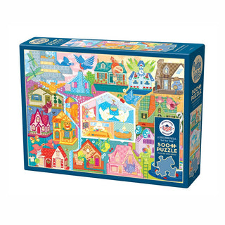A 500-piece Rainbow Birdies jigsaw puzzle by Cobble Hill featuring colorful illustrated houses, birds, and animals. The box is blue with the brand name in the top right corner.