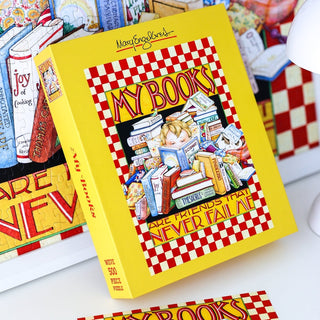Sure! Here’s a rewritten version using the provided data: The WEVE My Books 500 Piece Jigsaw Puzzle is crafted from premium blue board and features an enchanting Mary Engelbreit illustration of a person surrounded by stacks of books.