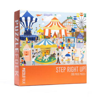 The Step Right Up! 500 Piece Jigsaw Puzzle by Puzzlefolk features colorful illustrations of a lively carnival scene with rides, tents, and people.
