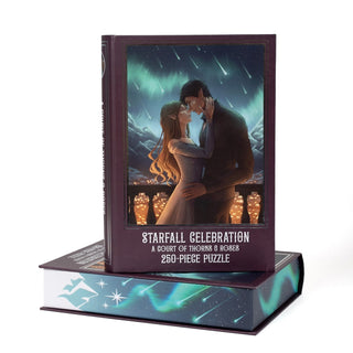 Experience the Starfall Celebration | 250 Piece Jigsaw Puzzle by Kingdom of Threads, featuring an illustrated couple kissing beneath aurora lights. This enchanting fantasy puzzle comes in a stunning book-shaped keepsake box, making it a perfect addition to any A Court of Thorns and Roses puzzle collection.