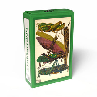 The Penny Puzzle Grasshoppers | 99 Piece Jigsaw Puzzle comes in a green rectangular box featuring a vintage scientific illustration of various grasshoppers on the front, inspired by E. A. Séguy’s Art Deco puzzles—an ideal choice for collectors of vintage mini puzzles.