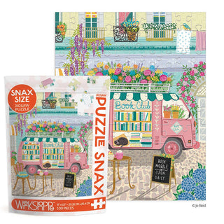 WerkShoppe’s Mobile Book Club 100 Piece Jigsaw Puzzle comes complete with packaging, both featuring a charming van surrounded by flowers and books with a ‘Book Mobile Open Daily’ sign—a delightful puzzle for young readers.