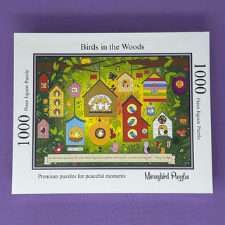 Birds in the Woods | 1,000 Piece Jigsaw Puzzle by Mimsybird Puzzles features colorful illustrated birdhouses and birds, ideal for nature lovers. The brand name appears at the bottom right of the box.