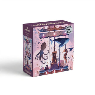 A square Le Carousel 352 Piece Jigsaw Puzzle box featuring an illustration of an ocean animal carousel with an octopus, a whale, and a seahorse.