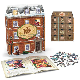A Boardwalk Puzzle Company A Christmas Carol Jigsaw Puzzle Advent Calendar with twelve numbered compartments, an open storybook, and a pile of scattered jigsaw puzzle pieces.
