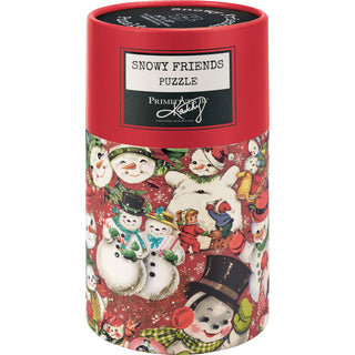 Snowy Friends | 500 Piece Jigsaw Puzzle by Primitives by Kathy comes in a cylindrical container with vintage snowmen, animals, and festive holiday designs on a red background—an ideal Christmas puzzle.