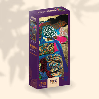 A rectangular box of the Dope Pieces Fogueira 1,000-piece puzzle featuring Ananda Nahu’s colorful abstract art of a woman with bold colors and intricate patterns on the front.