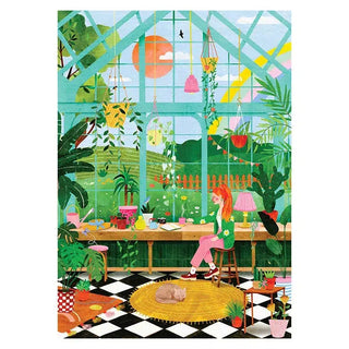 A woman sits on a stool in a bright greenhouse filled with plants as sunlight streams in and a cat naps on a yellow rug—perfect for anyone who loves relaxing puzzles like the Trevell Green Dream 500 Piece Jigsaw Puzzle.