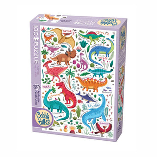 The Cobble Hill "Rawr! (Dinosaur)" 100-piece jigsaw puzzle features colorful cartoon dinosaurs, labeled sounds, and plants on a white background with larger pieces for easy handling.