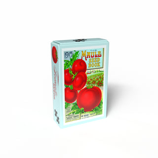 A rectangular box featuring vintage red tomato artwork and "1915 The Maule Seed Book" text displays the Penny Puzzle Tomato Seeds 99 Piece Jigsaw Puzzle, showcasing a charming vintage seed bag design on a white background.