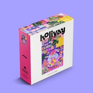 A 1,000-piece Holiyay Puzzles box titled “Creative Space,” featuring vibrant, cartoon-style artwork inspired by Marie Boiseau and displayed on a lavender background—perfect for fans of artist’s workspace puzzles.