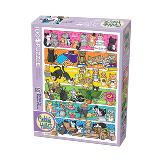 The Doodlecat Days 100 Piece Jigsaw Puzzle by Cobble Hill features cats on colorful shelves with books and objects labeled “love,” “learn,” and “rest.” The box contains 100 random-cut pieces.