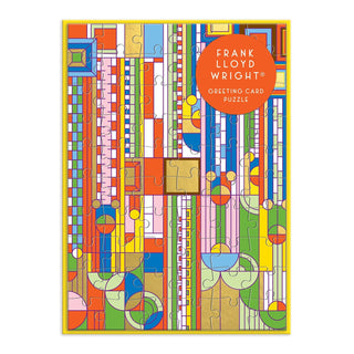 Galison’s Frank Lloyd Wright Saguaro Forms & Cactus Flowers 60-piece greeting card jigsaw puzzle features colorful intersecting lines, circles, and rectangles inspired by the iconic design.