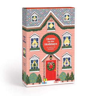 The Home for The Holidays Christmas 500 Piece Jigsaw Puzzle by Galison comes in a festive box decorated like a holiday house with wreaths and presents—a charming seasonal puzzle perfect for the holidays.