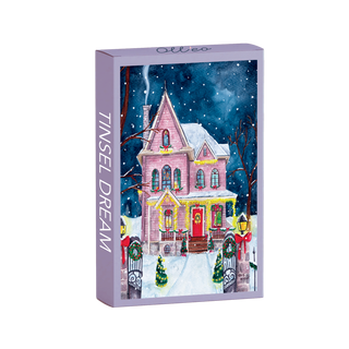 A purple box labeled "Tinsel Dream | 99 Piece Jigsaw Puzzle" by Olleo Puzzles features a pink Victorian home decorated for Christmas in a snowy night scene, illustrated by Louise Gobinet.