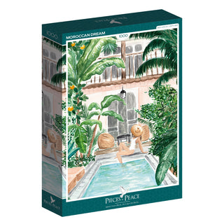 Immerse yourself in the Moroccan Dream | 1,000 Piece Jigsaw Puzzle by Pieces & Peace. Made in France, this intricately designed puzzle showcases an elegant illustration of a woman relaxing by a pool within a lush courtyard setting, complete with palm trees and an architectural backdrop. Its finished size is ideal for framing, making it a sophisticated addition to any puzzle collection.
