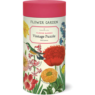 The Flower Garden | 1,000 Piece Jigsaw Puzzle by Cavallini & Co. features vibrant flower and hummingbird illustrations in a vintage style, making it an ideal choice for fans of classic print puzzles.